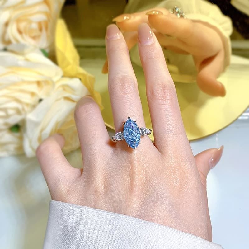 Three Stone Marquise Cut Aquamarine Engagement Ring